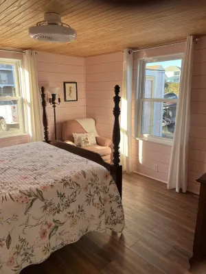 The Pink cottage on West Beach, water front , short walk to beach
