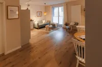 Vacation apartment between forest and lake with two terraces