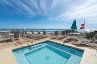Beachfront Condo with King Beds, Pool, Hot Tub, Baby Gear & Beach Chair Setup!