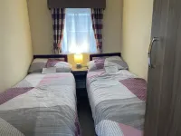 Comfortable lodge with hot tub.internet and netflix Hotels in 