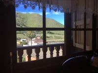 Rural house in a valley with sea views and swimming pool.