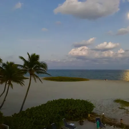 BEACHFRONT COMPLEX! STEPS FROM THE OCEAN! HEATED POOL FULL KITCHEN FREE PARKING