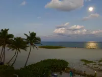 BEACHFRONT COMPLEX! STEPS FROM THE OCEAN!  HEATED POOL FULL KITCHEN FREE PARKING