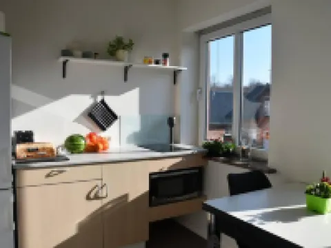 ラブリー タウン アパートメント - スリープス 5, パーキング & ガーデン グラムのホテル