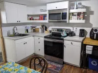 Lovely basement apartment with covered outdoor patio.