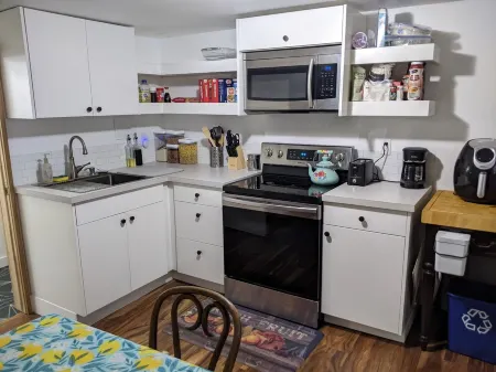 Lovely basement apartment with covered outdoor patio.