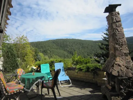 On the edge of the forest with a beautiful panoramic view of 2 valleys