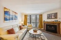 Cozy Living Room with Gas Fireplace and Balcony - Spacious Ski Retreat