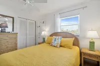 Deeded Beach Access and Scenic Balcony Escape - Charming Coastal Haven