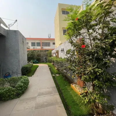 Guest House Quatre Saisons Hoteles cerca de Fidjrosse Beach