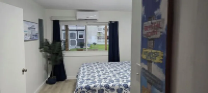 Charming 1-bedroom apartment with King Bed.  No Stairs.  Steps to the Ocean.