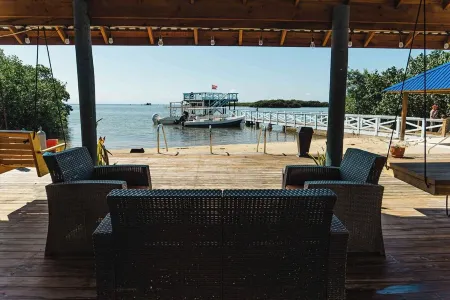 Spacious 5-bedroom beachfront home with AC centrally located in Roatan.