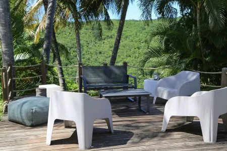 Bungalow 6 Pers. Vue mer et Montagne, Cuisine Équipée. Réservez Votre Paradis! Отели рядом с достопримечательностью «Deshaies»