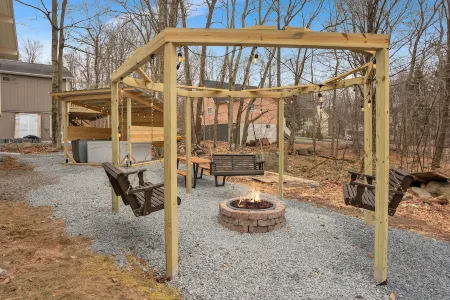 Beautiful Poconos Getaway with Game room ,Hot Tub, and Fire pit