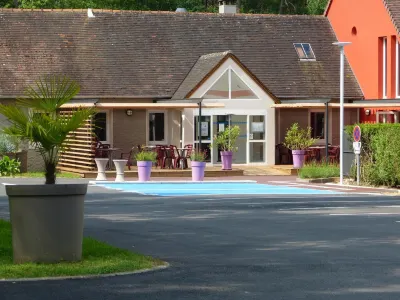 Hotel Arbor - les Hunaudieres - le Mans Sud - Mulsanne فنادق في Teloche