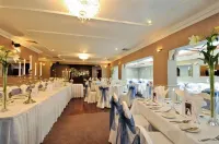 Maples House Hotel - Parkplatz