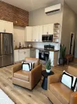 Stylish & Modern 2-Bdrm Apt in Downtown Warsaw featuring an urban rooftop deck.