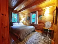 Escape to Howie's Camp: Unwind and Recharge at This Lakefront Log Cabin