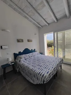 Villa with large garden a few steps from the beautiful beach of Costa Rei