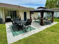 Steps to Titletown District- Spacious 4-bedroom  with large patio, heated garage