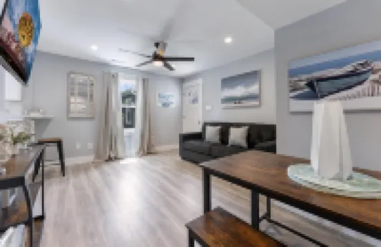 Stainless Steel Appliances and Flat-Screen TV - Modern Coastal Retreat