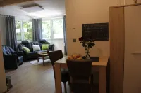 Modernly Furnished Bungalow with Fireplace, Surrounded by Greenery. Hotel a Friedrichroda