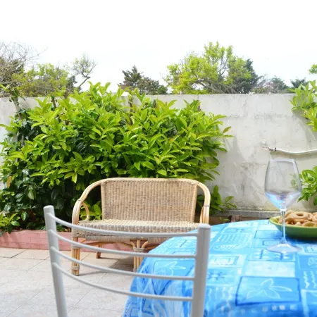 Charming Home on the Beach with Spacious Terraces & Garden; Pets Allowed;