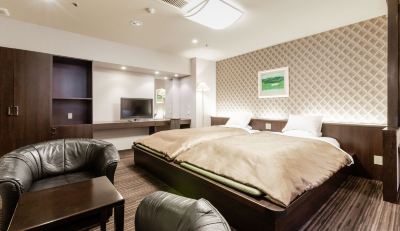 メインビルの高層フロアツインバス付き 湯田温泉 ユウベルホテル松政の写真