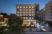 Qianna Hotel (Zhengzhou Erqi Square Dennis David City) Hotel a Zhengzhou