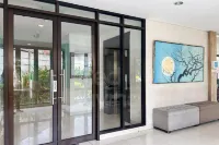 RedLiving Apartemen Eco Home - Wieg's Room Tower B Yashinoki Hôtels à : Sindang Jaya