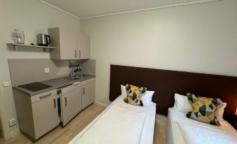 Doppelzimmer mit Bad und Küche