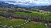 Creekfront Hayesville retreat w/ wrap-around porch and views!
