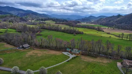 Creekfront Hayesville retreat w/ wrap-around porch and views!