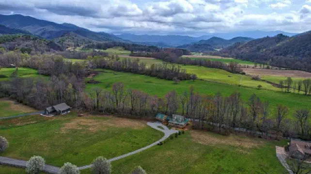 Creekfront Hayesville retreat w/ wrap-around porch and views!