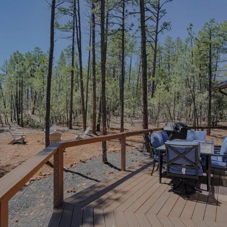 OASIS IN THE FOREST ON 1.25 ACRE BACKING TO NATIONAL FOREST WITH AC-PETS WELCOME