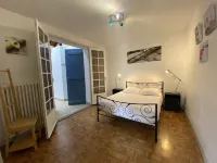 Village center, house, garden, walking distance to the beach, parking