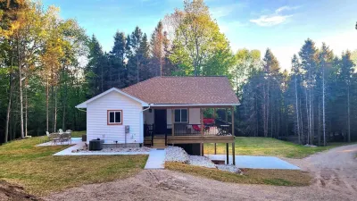 Experience panoramic views in ur 5-bed Frankfort retreat minute to Lake Michigan