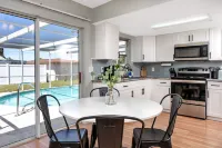 Sunny Escape: Vibrant Pool Home
