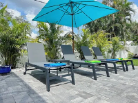 SunCoast Garden Family Retreat-Beautiful Vacation Home with Heated Pool.
