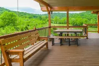 Gorgeous custom log cabin on 185 acres