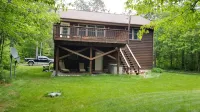 Time to relax and unwind…Cozy house in the woods minutes from downtown Minocqua