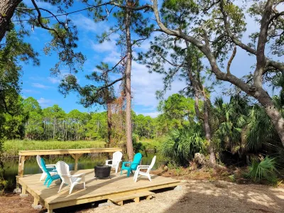 New modern home, 3 minute walk to the beach, on bike trail, full RV hookup