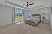 Bright airy lakeside home in gated community