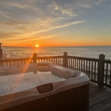 Luxury Beachfront Oasis with Hot Tub, Pet Friendly, Hammock, Swings, Loaded