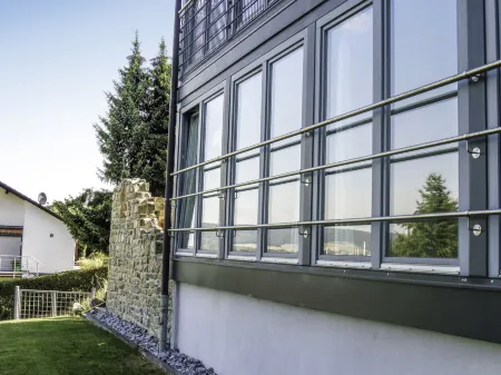 Am Waldrand Отели в г. Люгде