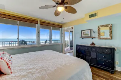 Beach Style Condo Includes Google Mini Home and Beach Access 2 Bedroom Condo by RedAwning