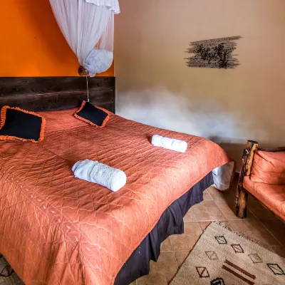 Osoita Lodge Hotels near Banda School