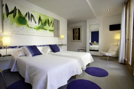 L'Host Boutique Rooms