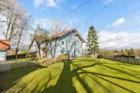Country magic Allgäu. Idyllic Scandinavian-style apartment surrounded by nature.