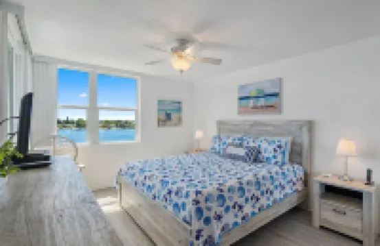 Balcony with Stunning Water Views and Pool - Gorgeous Waterfront Escape